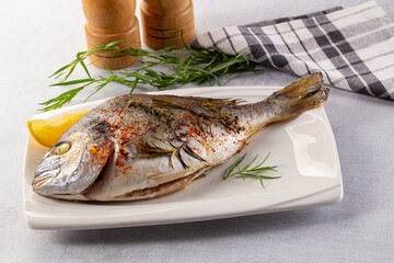 Baked dorada fish with spices