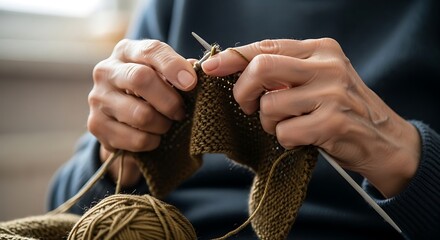 Hands knitting wool