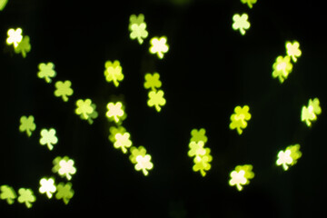 Green Lights Twinkling Like Shamrocks Create a Vibrant Atmosphere During a Festive Celebration at Night