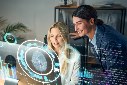 Biometric Security Analysis: Two Women Scientists Review Holographic Fingerprint Data In A Modern Office - Powered by Adobe