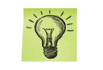 Lightbulb sketch on a lime green sticky note