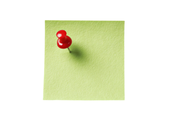 A single red pushpin in the center of a light green sticky note