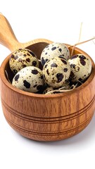 Quail eggs in wooden bowl