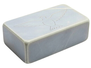 Grey marbled bar of soap with an embossed bird design on top on a transparent background