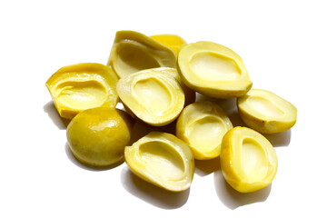 Salty pickled Ma-Muang Bao (Thai small mango) halves without seed.