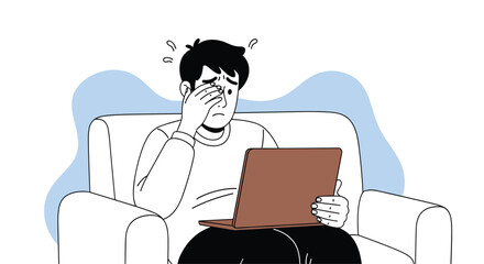 A person rubbing their eyes while looking at a laptop screen.