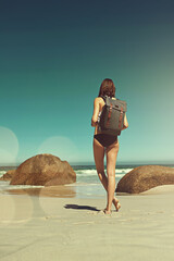 Backpacking, person and adventure at beach, scenery and mockup space on vacation, break and tourism. Water, view and traveller on summer holiday, outdoor or relax on getaway, back and peace in nature