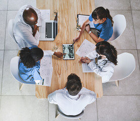 Meeting, brain scan and above of doctors on tablet for medical results, teamwork or planning. Healthcare, hospital and people on digital tech for surgery, consulting or screen for neurology diagnosis