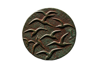 Ancient circular bronze medallion, verdigris patina, embossed stylized birds, isolated on transparent background, copy space, soft studio light. Concept of ancient artifact and wisdom