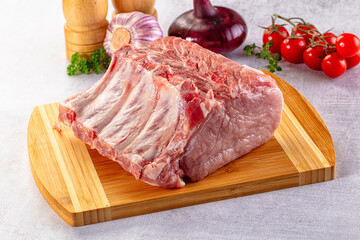 Raw pork loin with bone