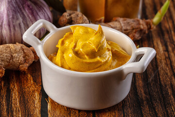 Indian yellow spicy curry sauce
