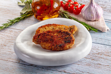 Breaded meat fillet escalope schnitzel