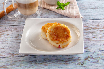 Fried homemade cottage cheese syrniki