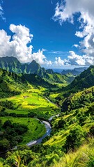Naklejka premium Lush green valley, river meandering through verdant rice paddies, mountains under a vibrant blue sky with fluffy white clouds