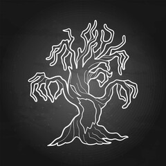Halloween dry tree with evil face
