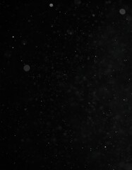 Obraz premium Abstract black background with floating particles