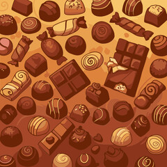 Assorted chocolates and candies in various shapes and sizes on a decorative background.