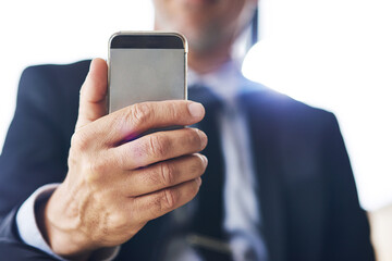 Communication, reading and hand of businessman with phone, email notification and digital schedule. Mature employee, networking and review online documents with mobile app, low angle and work info.