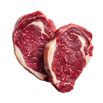 Two raw steak slices arranged in a heart shape