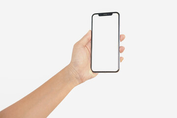 Close-up of female hand holding smartphone with blank screen isolated on white background. Smartphone in woman's hand with white screen