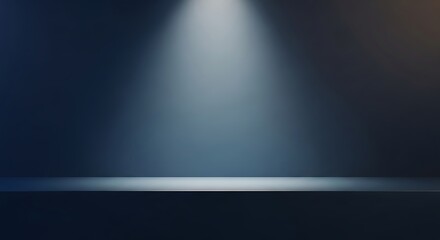 A dark blue studio background with a single spotlight illuminating a shelf, creating a dramatic and moody atmosphere