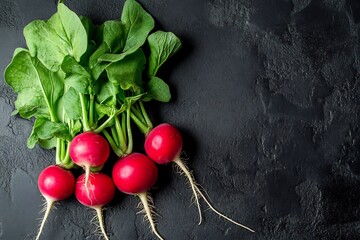 Fresh vibrant red radishes with lush green tops a delicious healthy harvest on dark background perfect for cooking and