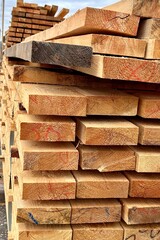 wooden boards stacked in a stack, side view