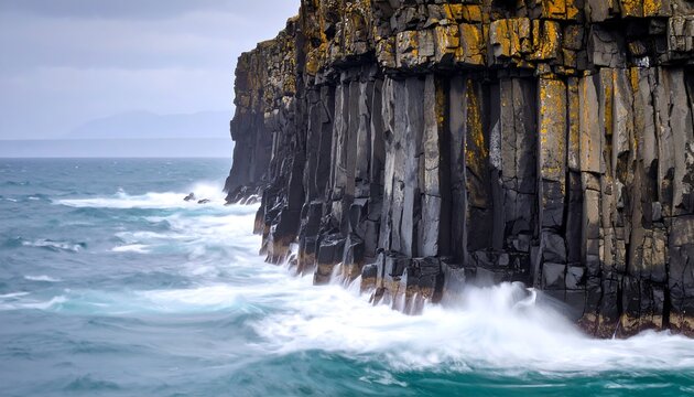 Dramatic coastal cliffs meet stormy sea
