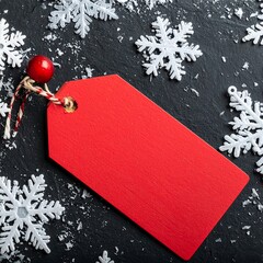 Red tag surrounded by snowflakes on dark background (1)