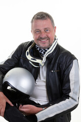 smiling handsome middle aged man friendly sit with motorcycle helmet happy wearing leather motorbike jacket on white background