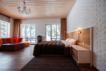 Cozy modern bedroom with natural light and stylish decor
