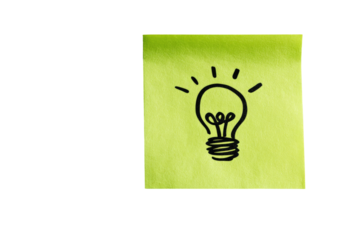 Lightbulb icon on a lime green sticky note
