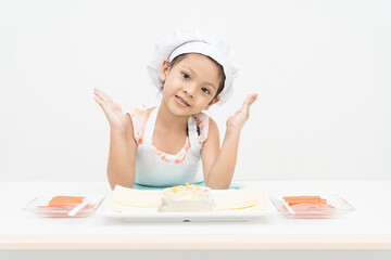 Asian girls are studying cooking on white backgrounds to develop life skills.