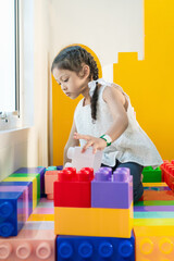 Girls continue to play plastic models to enhance imagination.