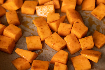 Seasoned Sweet Potato Cubes in Baking Tray Ready to Roast