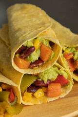 Corn Tortilla Tacos with Sweet Potato, Beans, Peppers and Smashed Avocado
