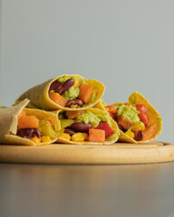 Corn Tortilla Tacos with Sweet Potato, Beans, Peppers and Smashed Avocado