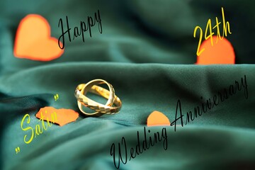 Gold Wedding Rings on Satin Fabric &ndash; 24th Wedding Anniversary. Luxurious still life of gold wedding rings on smooth satin fabric with soft highlights, symbolizing elegance and satin wedding 