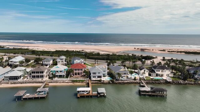 4K panoramic drone footage of waterfront community facing the Atlantic Ocean, Ormond Beach, Florida, USA RUS: