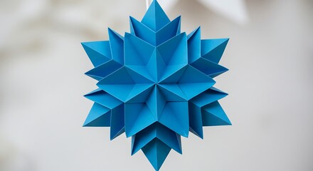 Geometric origami snowflake ornament
