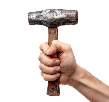 A hand holding an old fashioned hammer