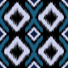 Ethnic ikat seamless pattern in tribal. © Onulo design