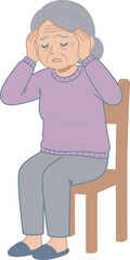 Elderly woman sitting on a chair, holding her head in distress or pain.