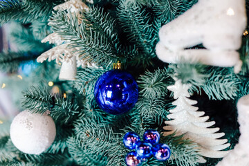 Colorful ornaments on a decorated Christmas tree enhance holiday spirit and joy