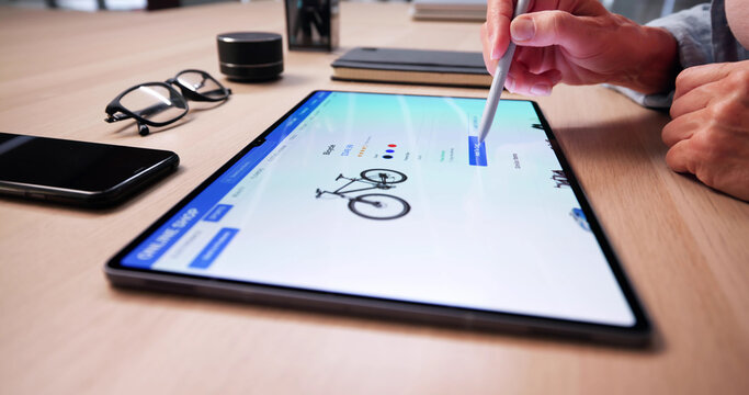 Fototapeta Woman Using Online Ecommerce Shop Featuring