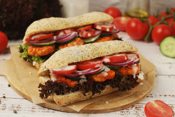 Baguette sandwiches with chicken and fresh vegetables	