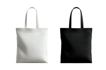Two blank tote bags, one white, one black, against a dark background
