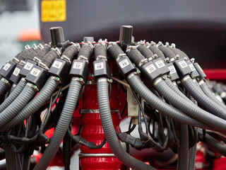 Agricultural Machine Hydraulic System with Valves and Tubes