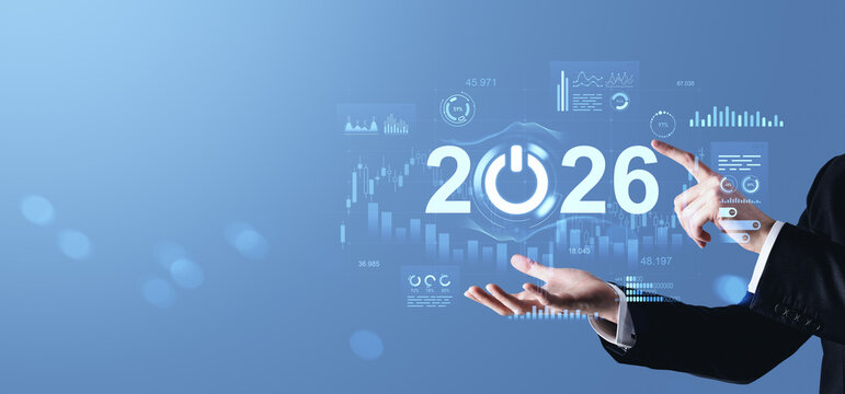 2026 digital future concept with businessman's hands and futuristic data graphs on blue background symbolizing innovation and economic evolution.