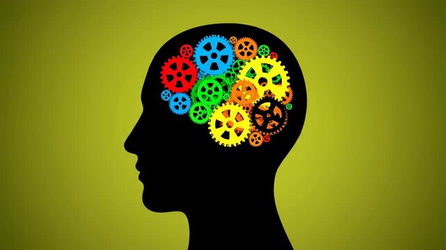 The silhouette of a human head is filled with colorful interlocking gears and cogs representing the complex process of thinking intelligence creativity and psychology